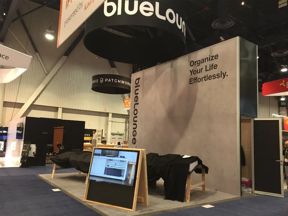 Bluelounge booth with grey Organize Your Life Effortlessly wall and wood easel screen