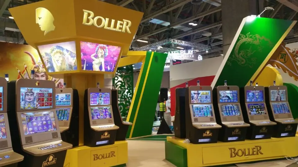 Slot machines on yellow bases with green panels and goddess artwork above