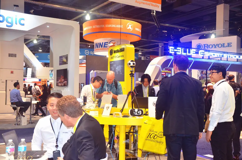 Visitors seated at the yellow counter with the hanging sign above