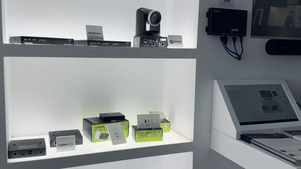 White shelves with a camera, connectors and demo devices