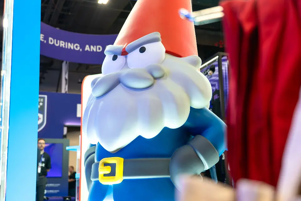 Close-up of the giant gnome statue's face and blue jacket