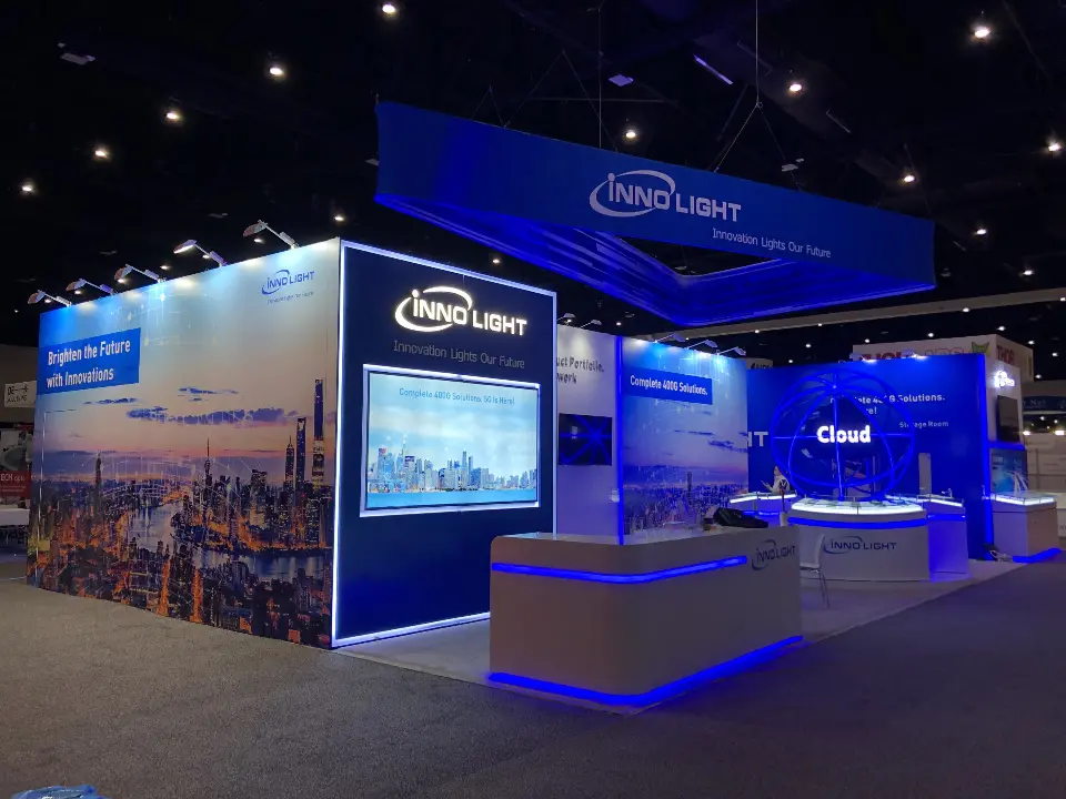 Wide view of the booth with skyline wall, counters and blue edge lighting