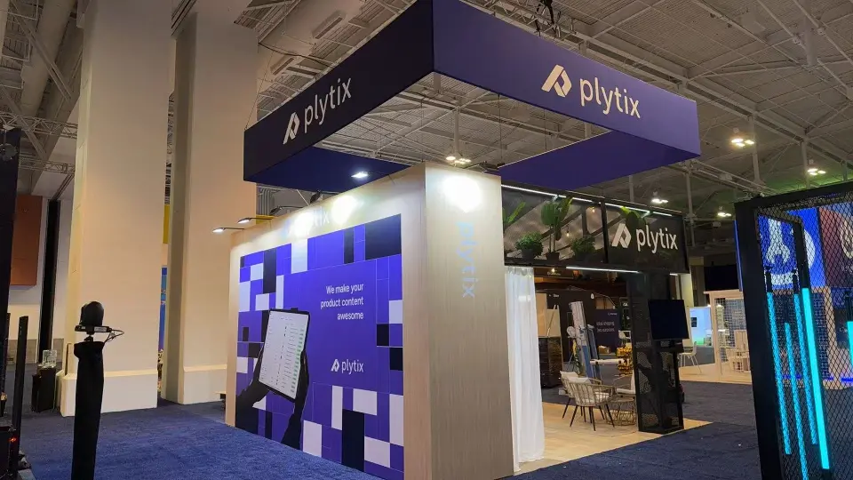 Corner view of purple pixel wall graphic beneath the purple Plytix header box