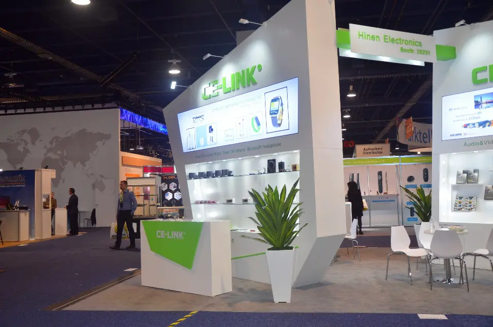 Side view of the booth with product shelves and graphics