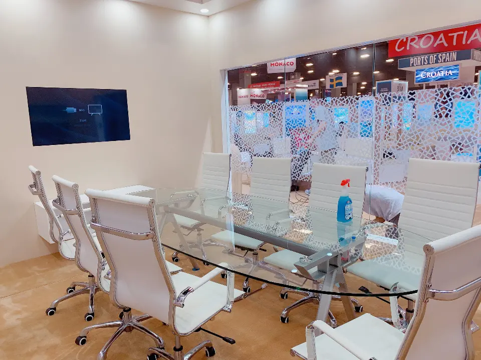 Meeting room from another angle showing two wall screens