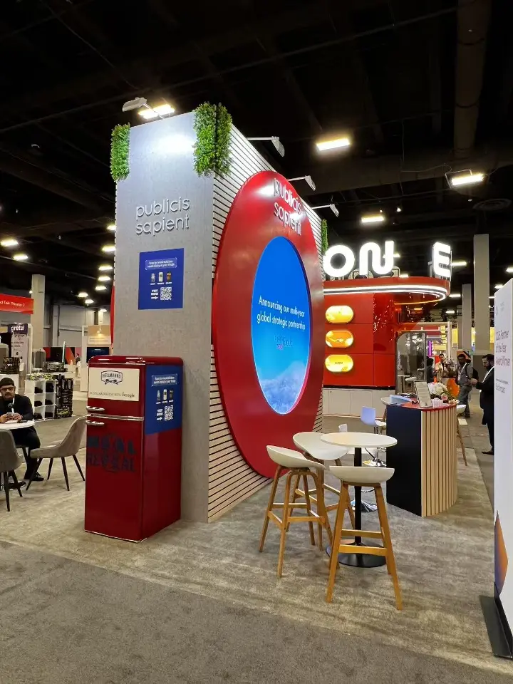 Narrow vertical view of the booth side with red ring screen and kiosk