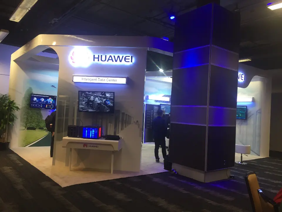Front of the booth with white arch, Intelligent Data Center sign and blue-lit column