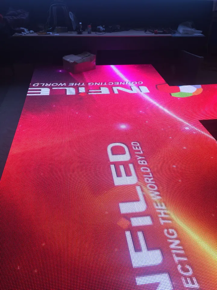 Another angle of the red video floor with scrolling lettering