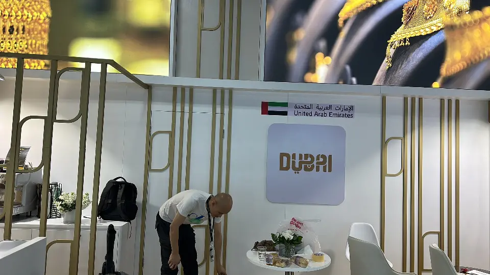 DUBAI wall panel with a UAE flag sign in a back meeting area