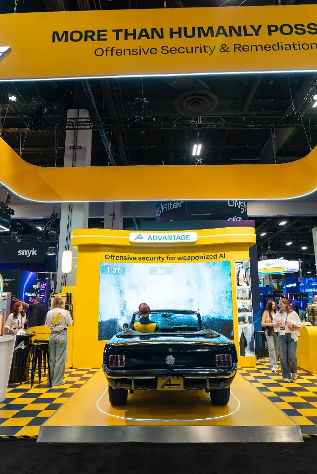 Portrait view of the convertible centered under the Advantage header and the hanging yellow frame