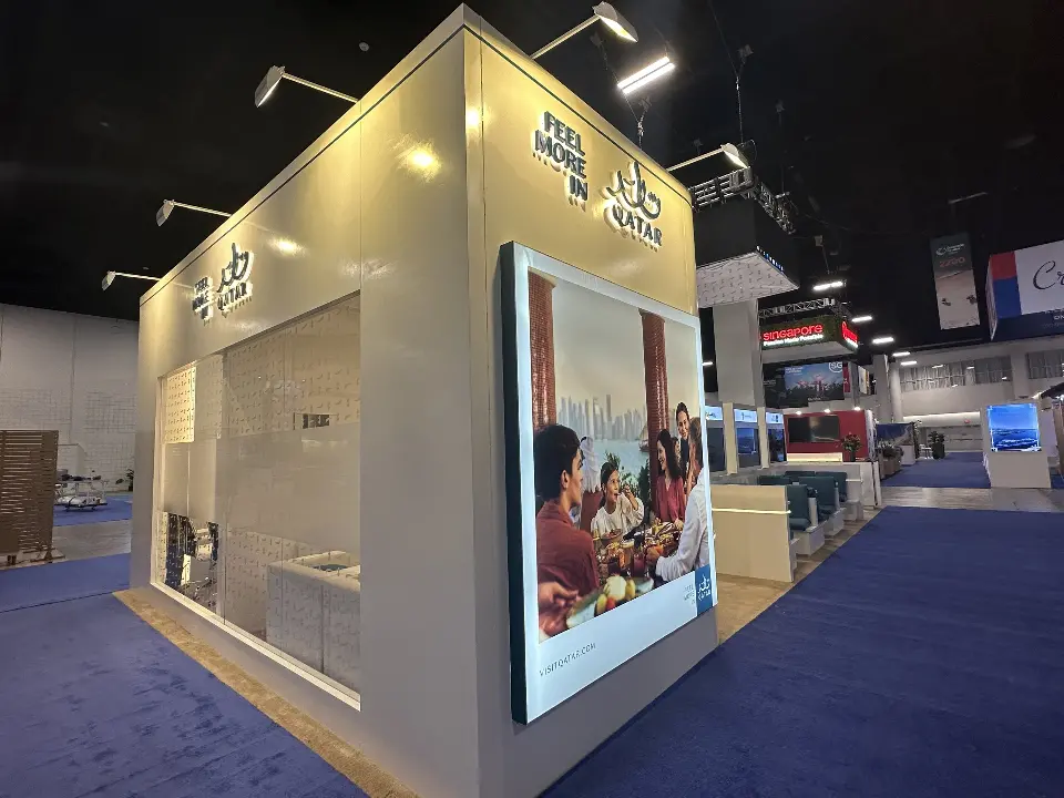 Cube corner with shelf niches and backlit family graphic