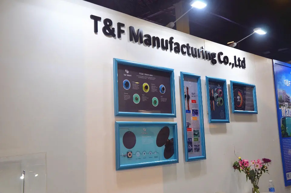Black dimensional T&F Manufacturing Co., Ltd lettering above blue-framed product graphic panels