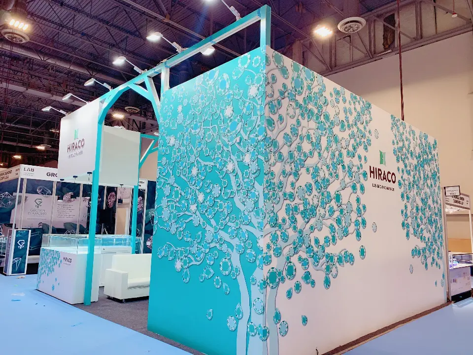 Teal side wall covered in a white tree graphic with the HIRACO logo