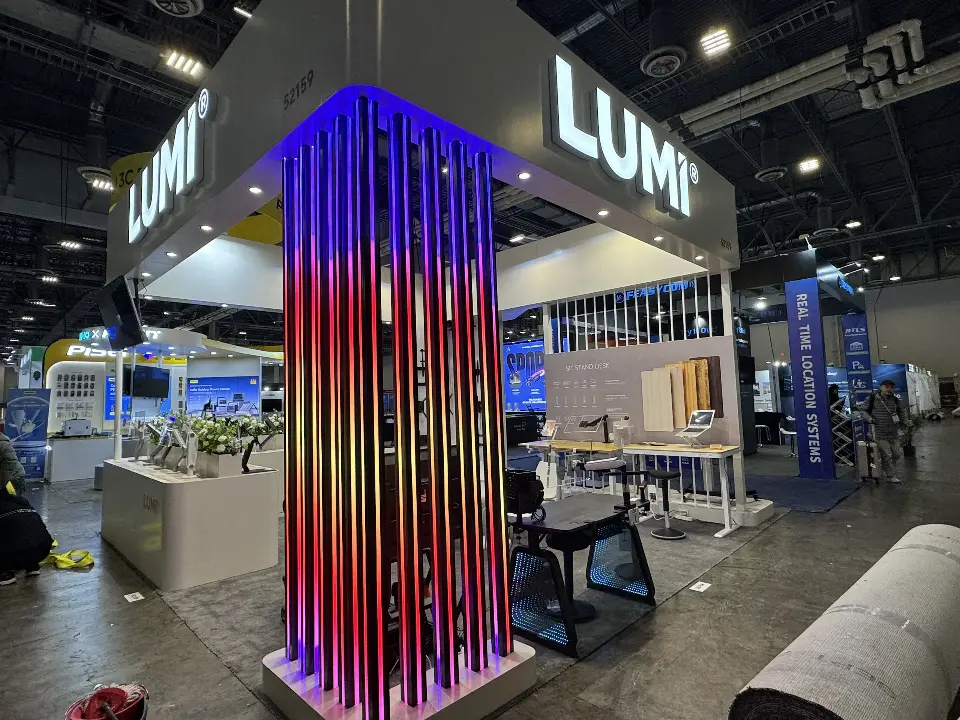 Corner column of red, purple and blue light strips beside the white frame
