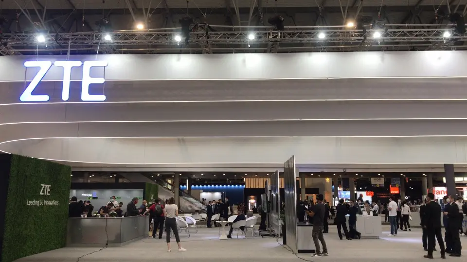 Low angle of ZTE logo on canopy with a white-lined interior behind