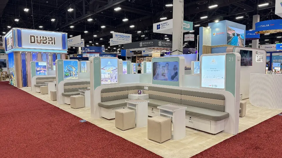 End view of seating pods with backlit Dubai graphics and white benches