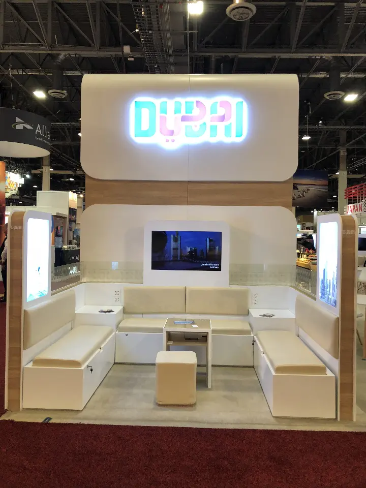 Seating nook with cream benches and a wall screen
