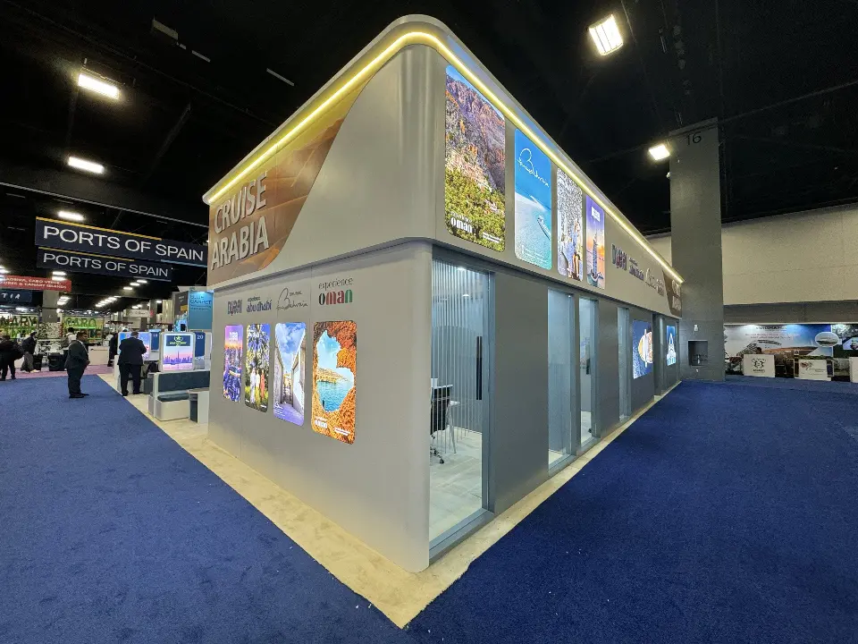 Side wall lined with portrait destination lightboxes under the curved header