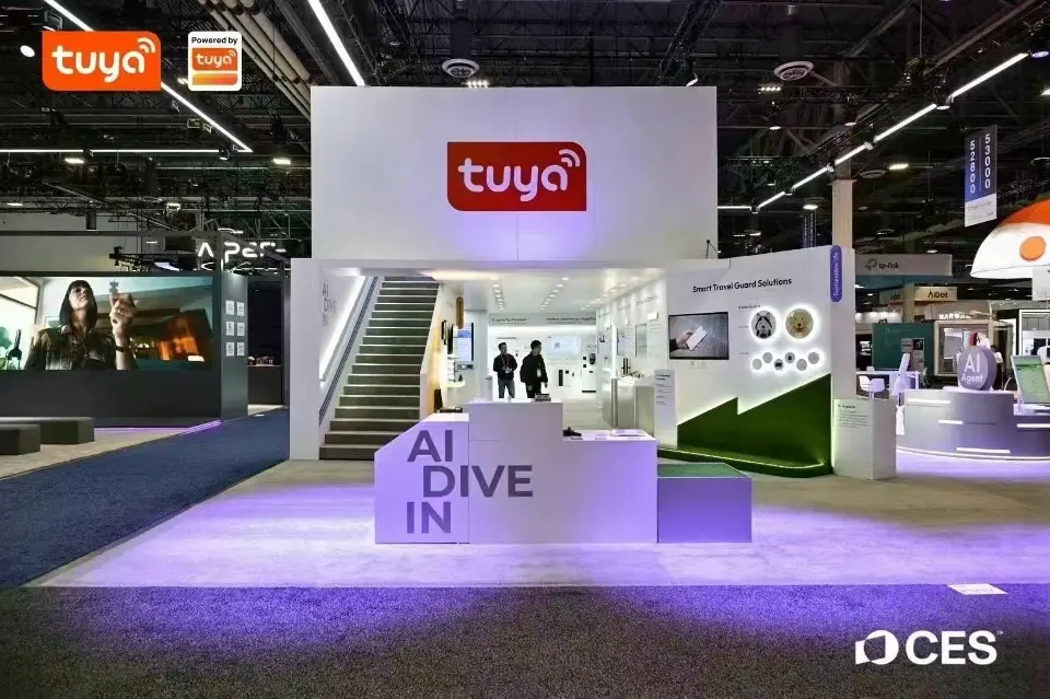 Tuya booth with staircase, AI Dive In wall and green turf panel