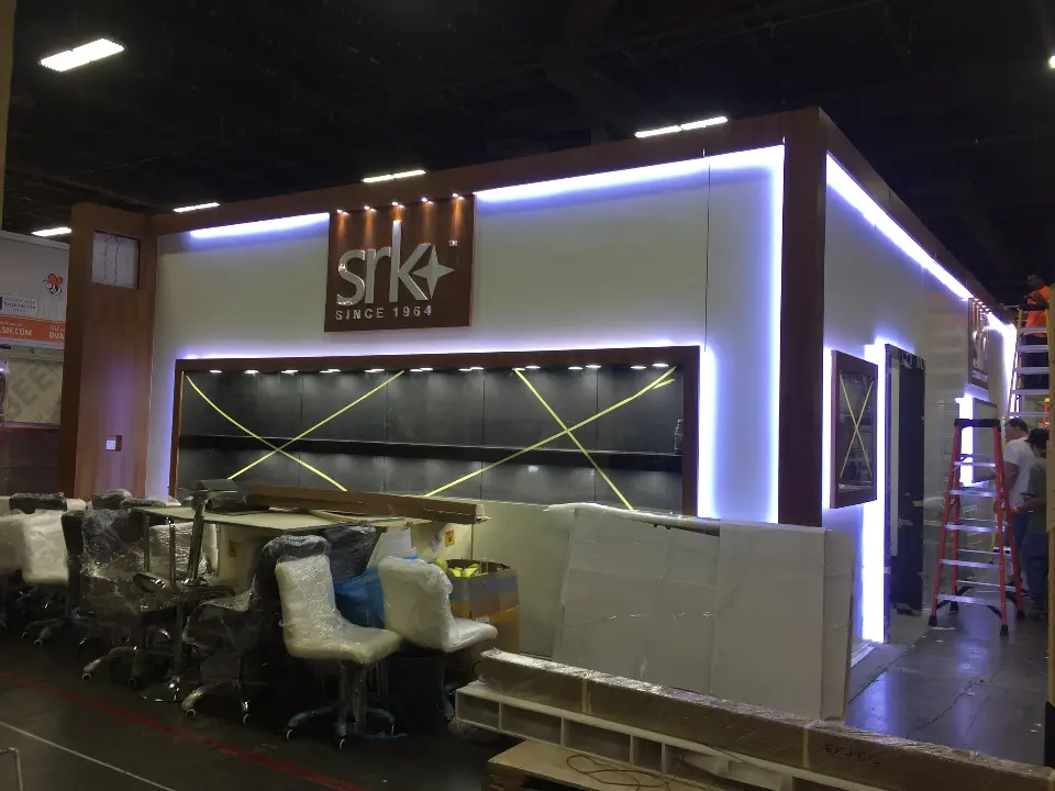 Closer front view of the SRK logo plaque above the dark showcase window