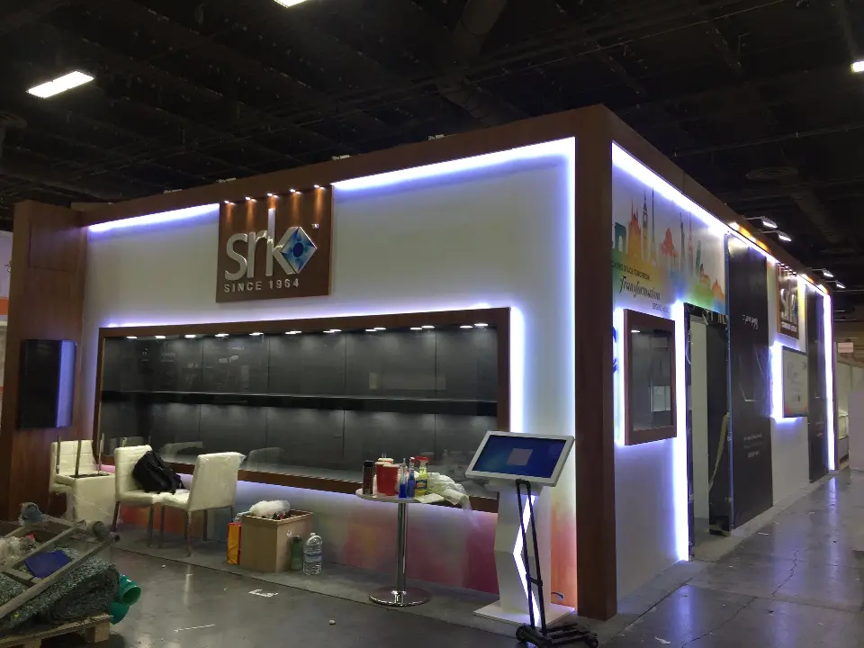Finished front with kiosk screen, white chairs and lit jewellery showcase