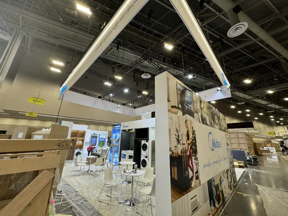 During installation: lifestyle graphic wall with cartons stacked in front