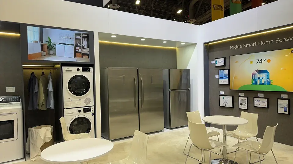 Laundry and refrigerator vignette with a round table and chairs