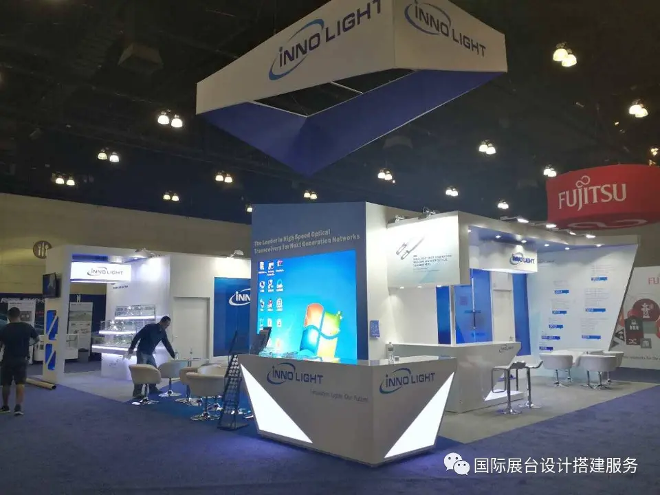 Whole InnoLight booth viewed from across the empty aisle