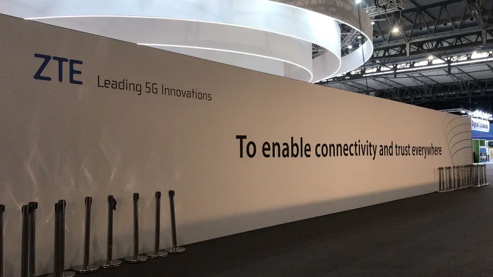 White wall with the line To enable connectivity and trust everywhere