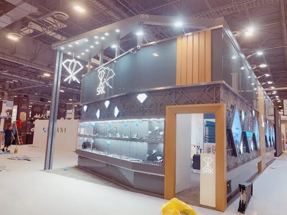 Corner view showing SRK logo, upper smoked band and framed doorway to showcases