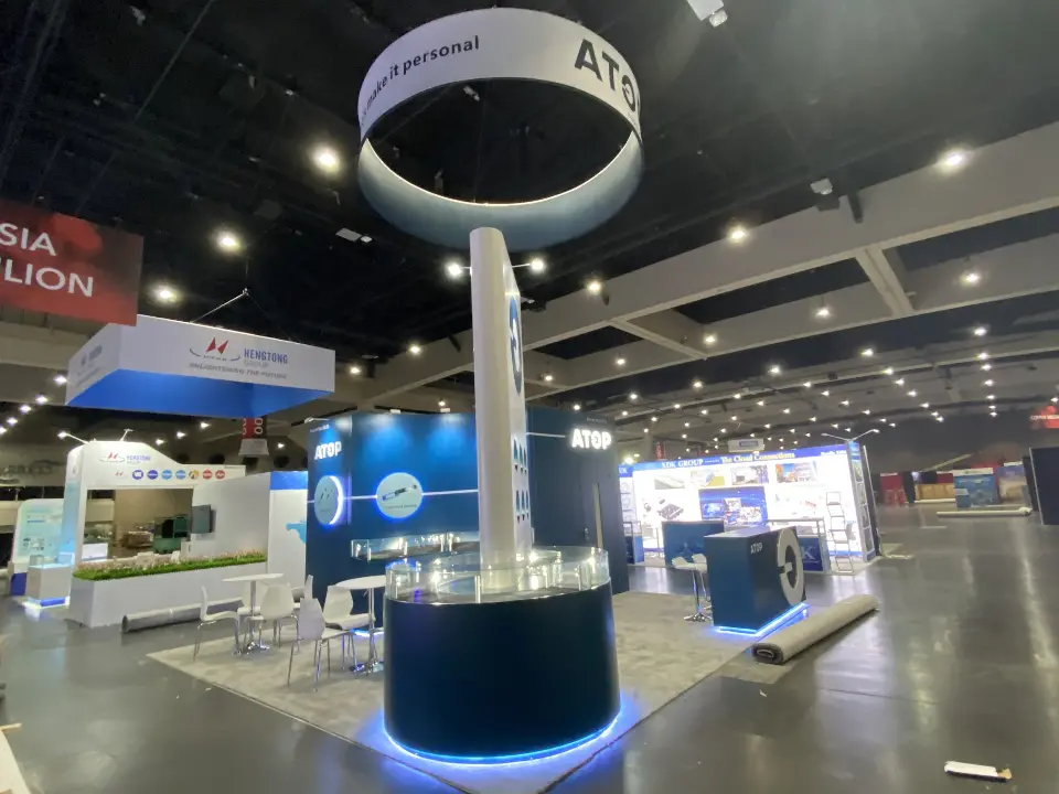 Wide view of the round showcase and cube in the quiet hall