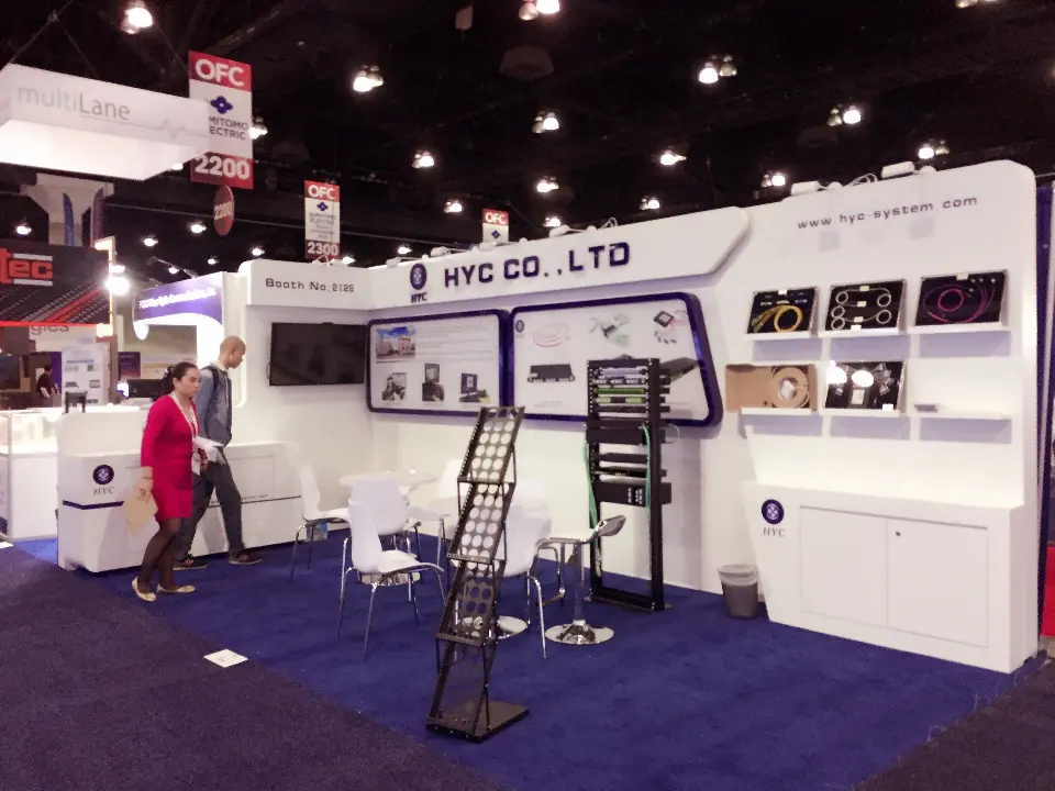 Daytime view with visitors, brochure rack, rack display and stocked product shelves