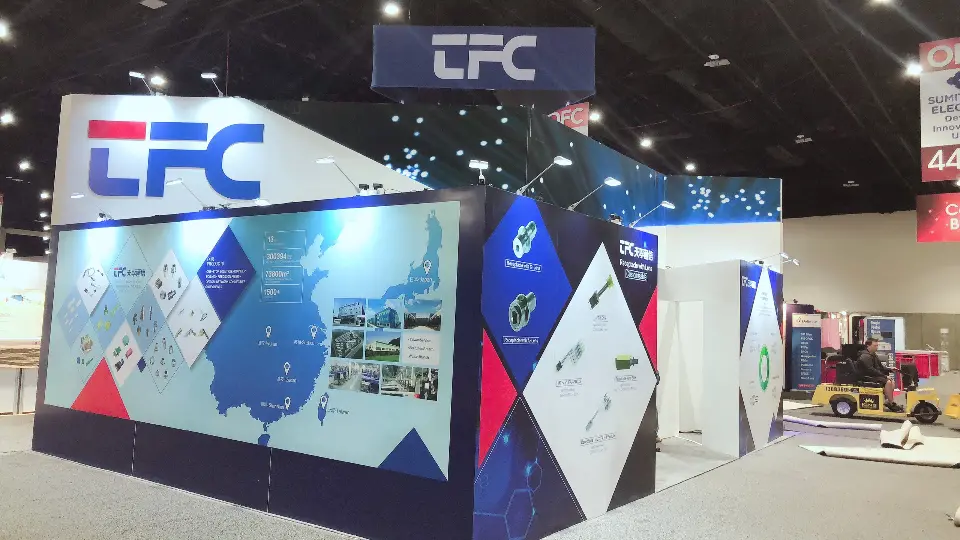 Side wall with red, white and blue diamond graphics and a map image