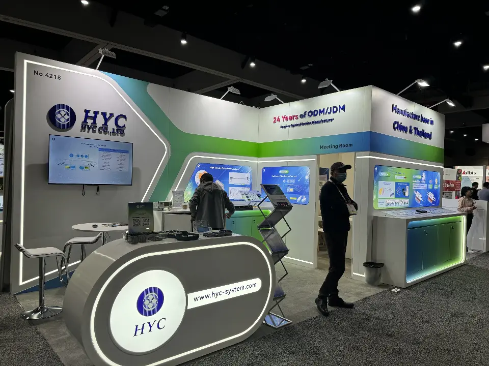 Front view with the oval HYC logo counter, wall screen and meeting room door