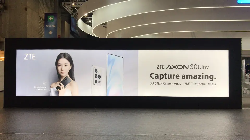 Large standalone screen with a phone campaign and Capture amazing tagline