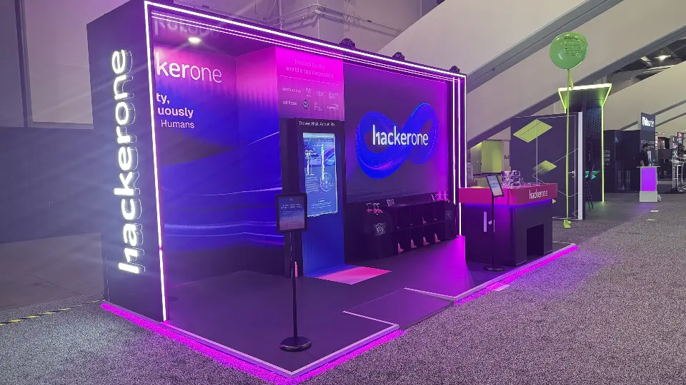 Corner with tall vertical hackerone lettering and lit side wall