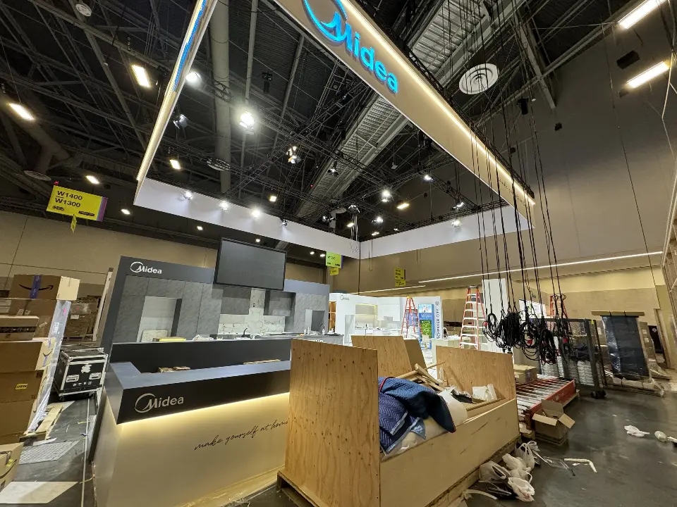 During installation: suspended frame and front counter with cardboard still on the floor