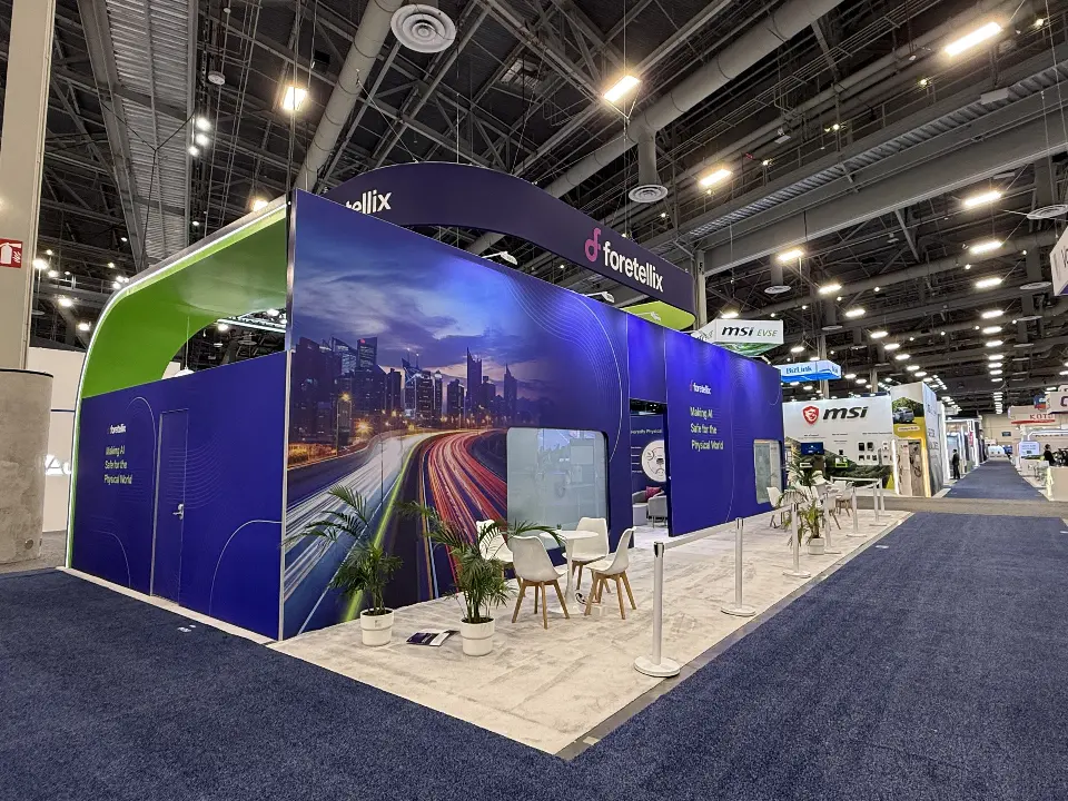 Exterior corner with the city light-trail mural and green arch top
