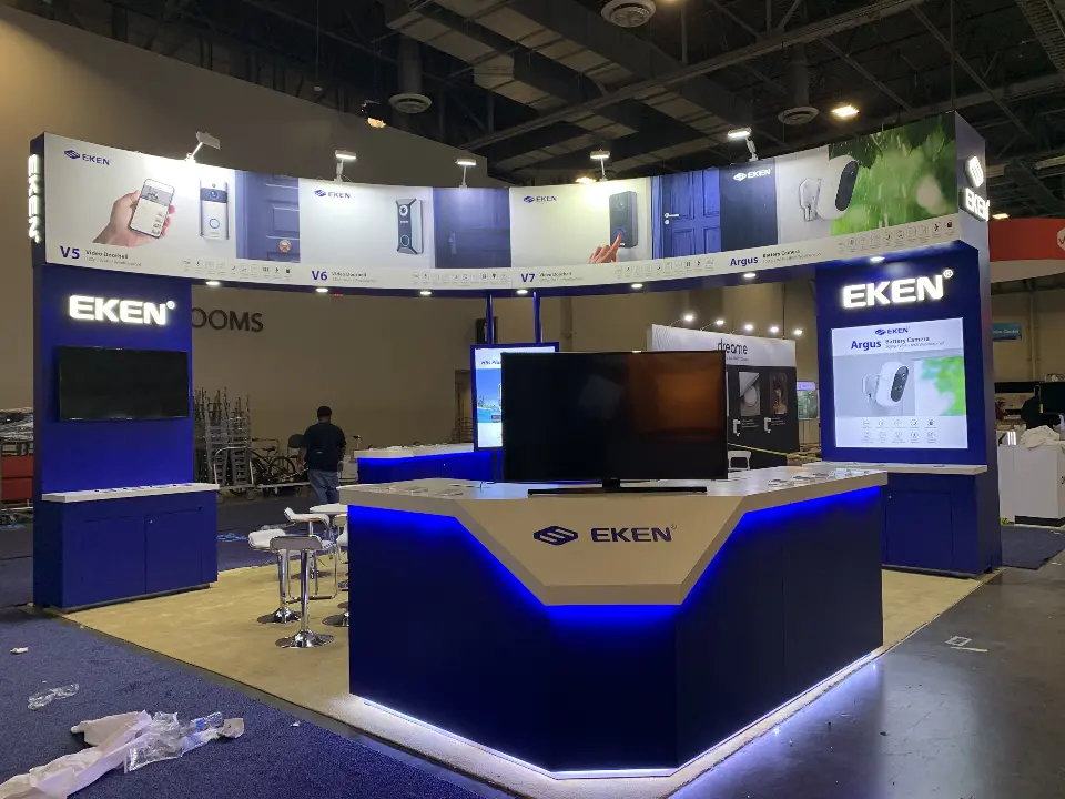 Faceted EKEN counter in front of a large screen and the white product header