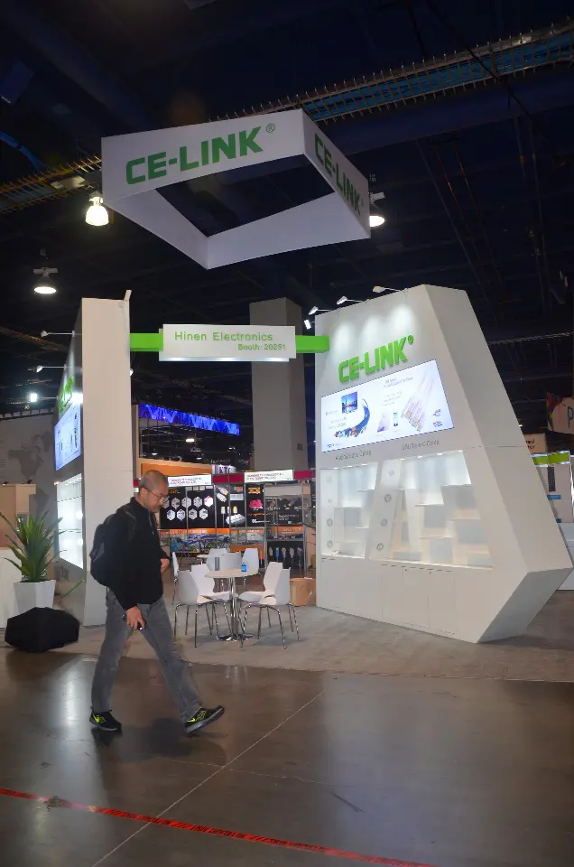 Portrait view from a distance showing the hanging sign over the booth