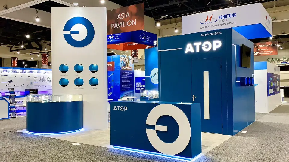 Navy cube with door, wall screen and the logo column in front