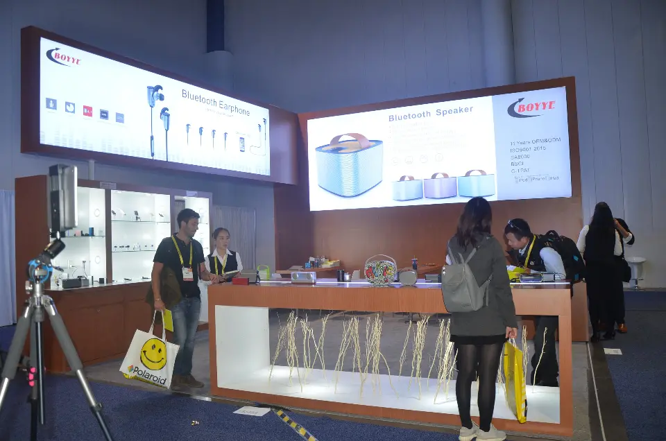 Front view of the counter and backlit graphics with a passing visitor