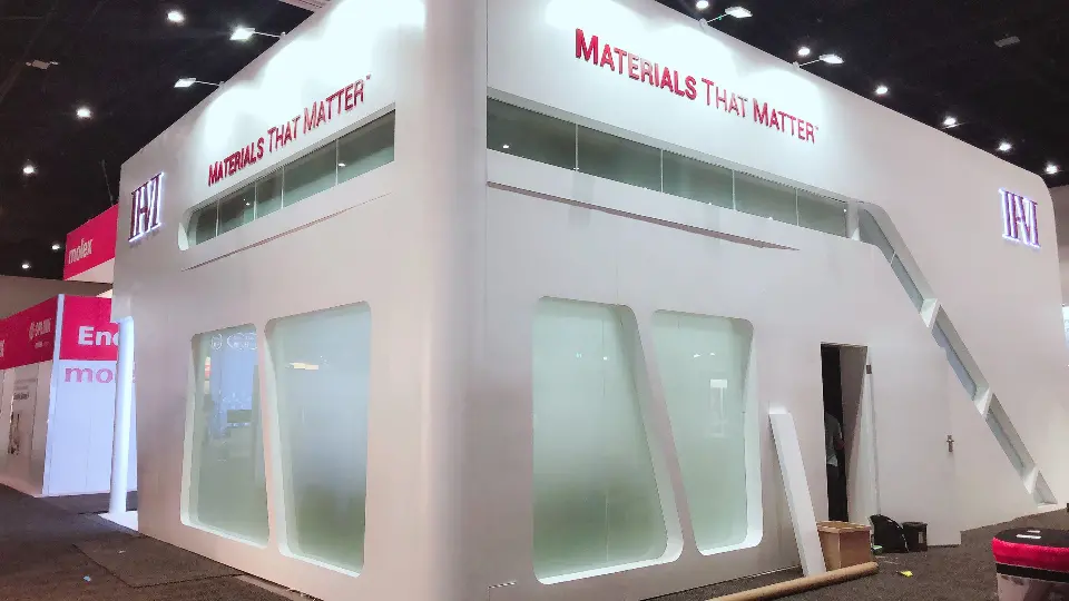 White fascia reading MATERIALS THAT MATTER above frosted glass panels