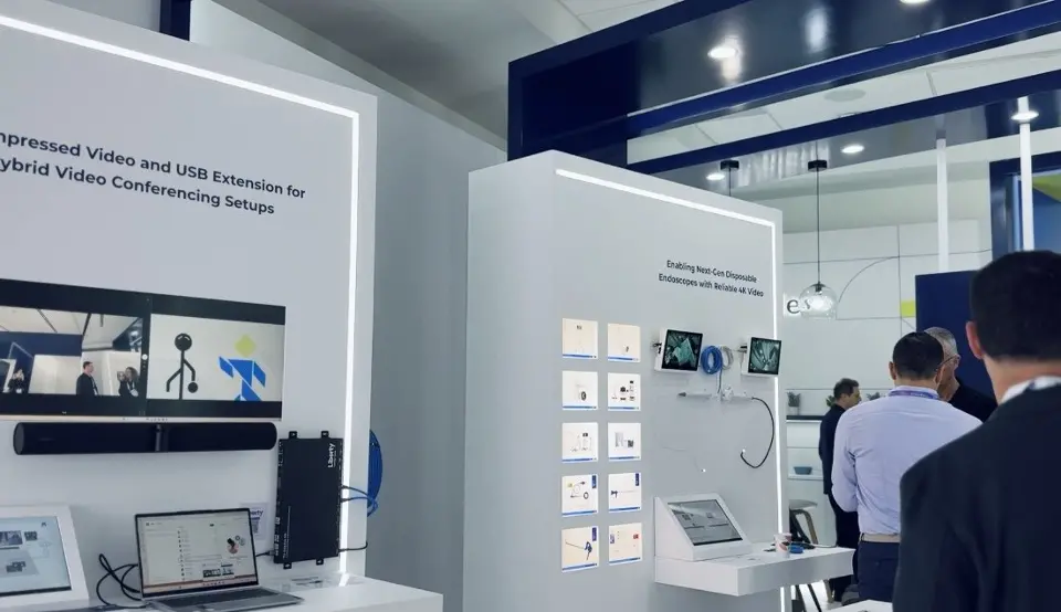 Product panel with connected devices and a visitor standing nearby