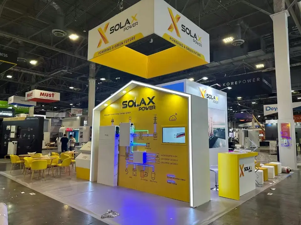 Corner view under the yellow square hanging sign with white wall and lit counter