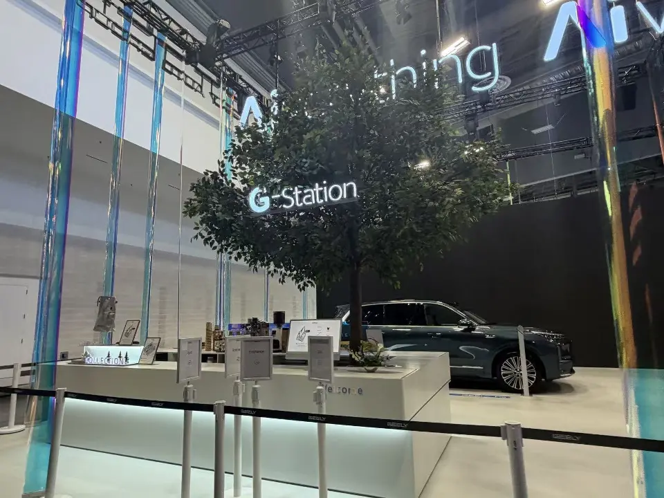G-Station counter with a tree and a dark SUV in the background