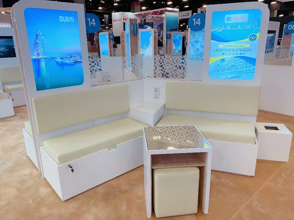 Close view of a bench pod with two lit panels and a small table