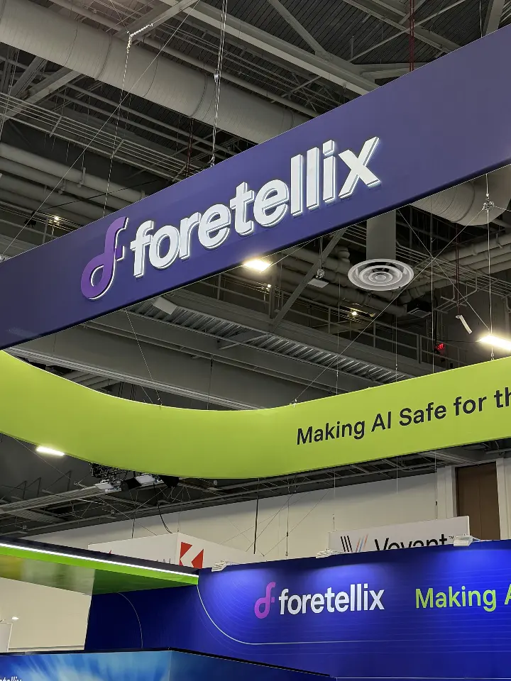 Low-angle view of the Foretellix lettering on the lime-green overhead ring