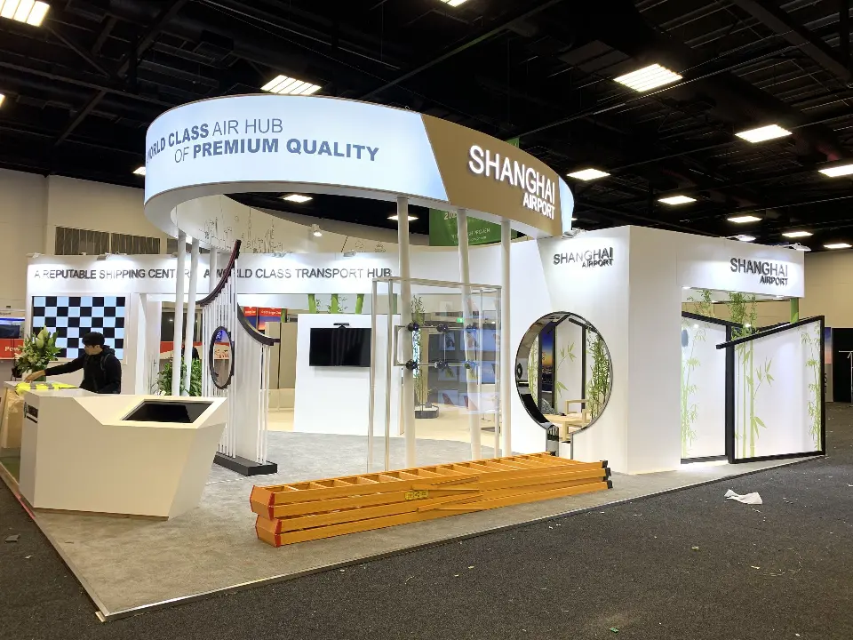 During build-up: front view with the backlit round header, angled counter and ladders on the carpet