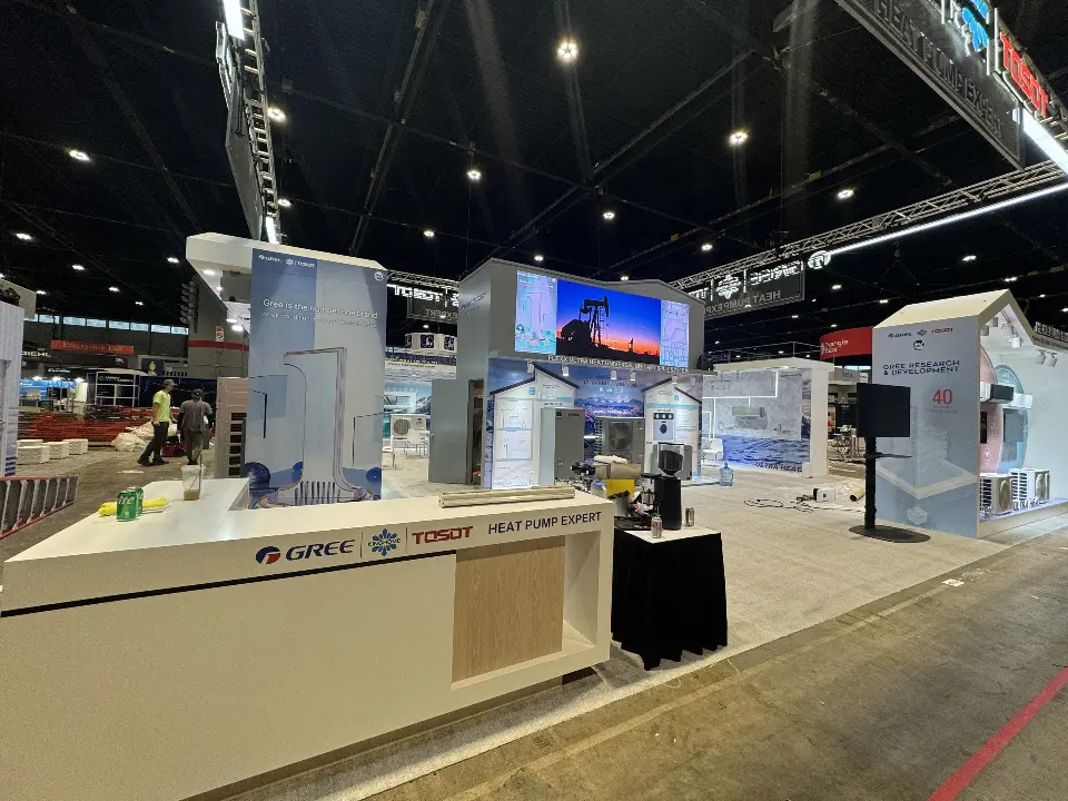 GREE counter and product rooms seen from the corner with a freestanding screen